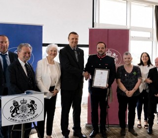 Bootle action group receiving their award 