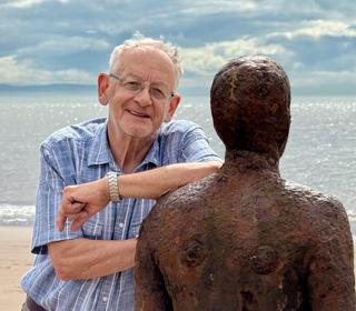 Photographer Ron Davies With Iron Man