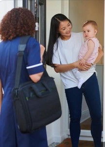 woman holding baby