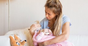 person holding baby