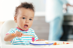 child eating food