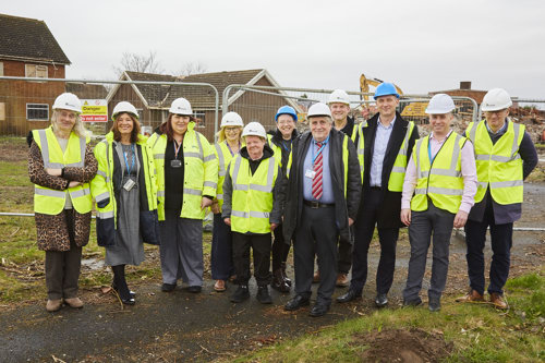 The co-production group on the new site in high vis jackets.