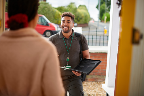 A social worker visiting a home.