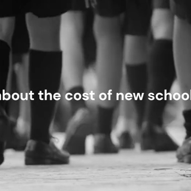 Black and white image image of  school children's feet and shoes walking away with the caption - worried about the cost of new school uniforms?