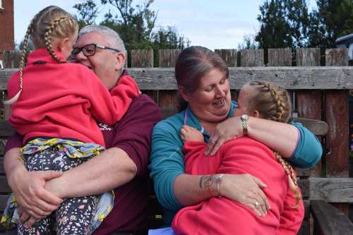 Adopters Helen and Andrew with their children