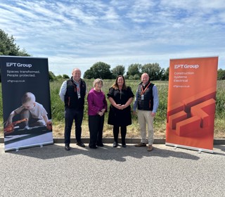 Cllrs Atkinson and Lappin (Centre) with EFT company directors Adam Watts and Stewart Meechan outside scrub land which forms the new site for the EFT team
