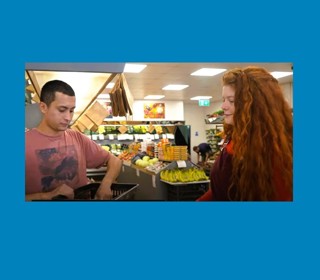 Screen shot from Healthy Start video of person shopping