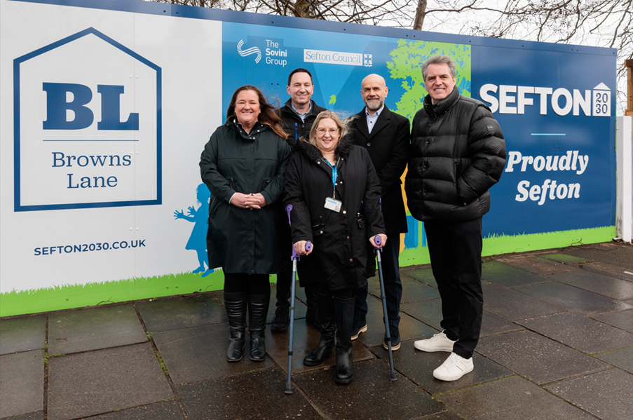 Sefton Council Leader Cllr Marion Atkinson and Cllr Carla Thomas Cllr. Joe Johnson, The Sovini Group CEO Roy Williams and Mayor of the Liverpool City Region Steve Rotheram in front of a hoarding that says Browns Lane and Sefton 2030 - proudly Sefton